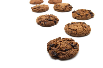 Fototapeta na wymiar Chocolate chip cookies crunchy delicious sweet meal and useful biscuits isolated on white background. Homemade pastry.