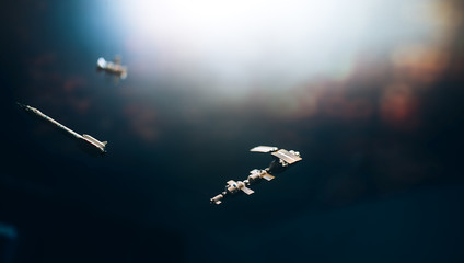 Space satellite orbiting the blue planet