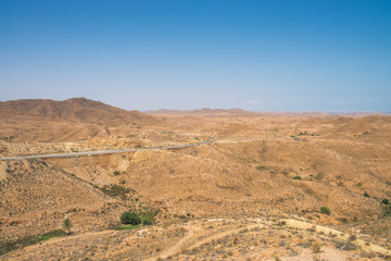 Fototapeta na wymiar Matmata desert Wide plans for the desert landscape and mountains.