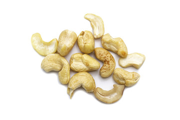 Malformed cashews nut salty roasted food ingredient natural isolated on white background.
