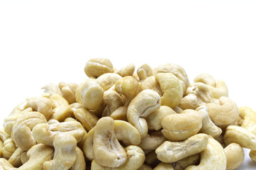 Pile of Cashews nut salty roasted food ingredient natural on white background.