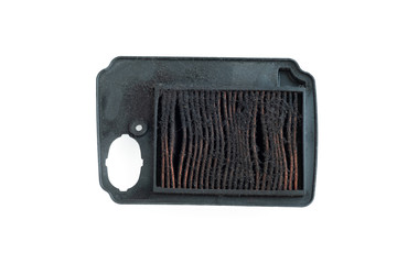 Dirty used motorbike air conditioner filter on white background