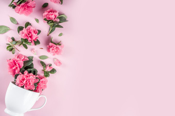 Tender Easter composition with easter eggs and pink spring flower branches