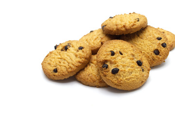 Chocolate chip cookies on white background. Pile of sweet biscuits delicious and crunchy homemade pastry.