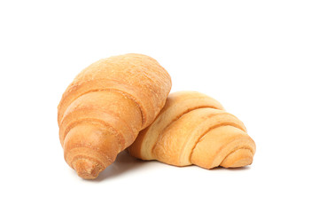 Freshly baked croissants isolated on white background