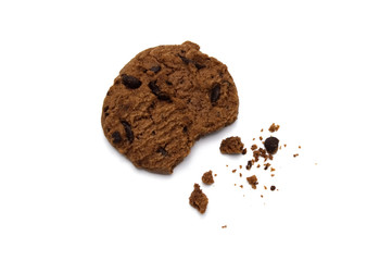 Chocolate chip cookies and crumbs on white background and Top view.