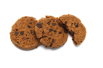 Chocolate chip cookies in pieces of inside on white background.