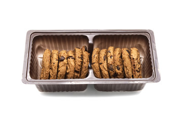 Chocolate chip cookies in a retail package container isolated on white background.