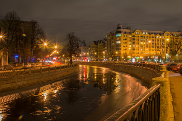 Fototapeta na wymiar Thin ice on the Karpovka River, St. Petersburg, Russia