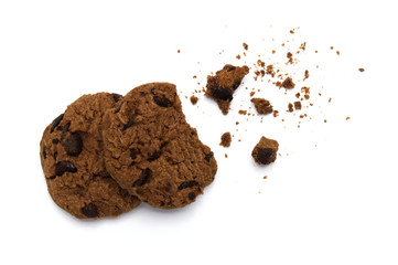 Chocolate chip cookies and crumbs on white background and Top view.