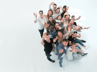 top view. group of happy young people looking at the camera