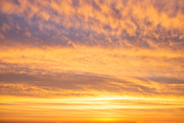 Painted by nature's colors, the sky of dawn or sunset. Bright colors of orange, violet and blue.
