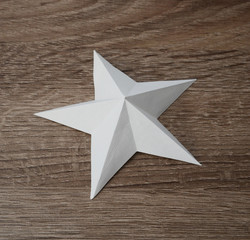 A white origami paper star