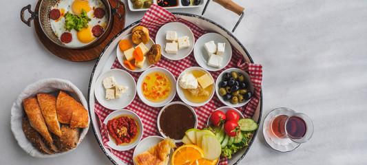 Delicious traditional turkish breakfast on the white table
