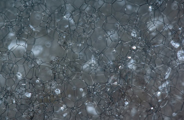 soap suds taken in close-up. Macro mode. Backgrounds and structure of soap suds at high magnification