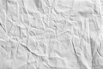 Grey crumpled background paper texture