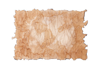 Top view on a sheet of blank ancient shabby torn paper, scroll or parchment with burned edges, isolated on a white background.
