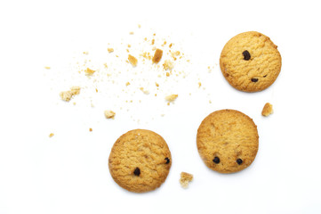 Chocolate chip cookies and crumble cracks on white background. Sweet biscuits delicious and crunchy...