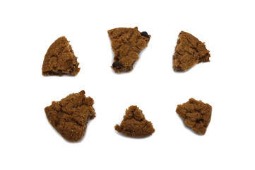 Biscuit with chocolate chip flavored. Some broken and crumbs of crunchy delicious sweet meal and useful cookie with isolated on white background.