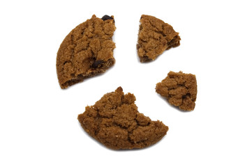 Biscuit with chocolate chip flavored. Some broken and crumbs of crunchy delicious sweet meal and useful cookie with isolated on white background.
