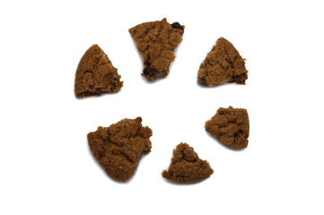 Biscuit with chocolate chip flavored. Some broken and crumbs of crunchy delicious sweet meal and useful cookie with isolated on white background.