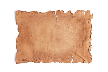 Horizontally oriented vintage ancient damaged piece of paper, scroll or parchment with torn...