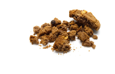 Biscuit with chocolate chip flavored. Some broken and crumbs of crunchy delicious sweet meal and useful cookie with on white background. Selective focus.