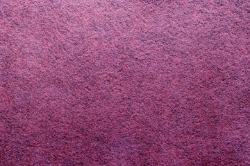 Violet purple color felt background. Surface of fabric texture. Colorful felt texture for background with copy space. Felt fabric sheet