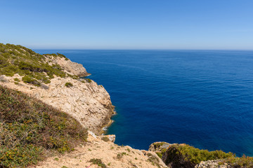 Rocky coast with blue sea. Cala Ratjada , north-east coast of Majorca. Spain
