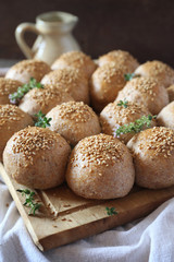 Crown sourdough bread buns with sesame and thyme