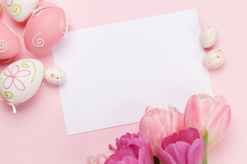 Easter greeting card with eggs and tulips