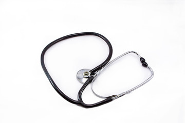 Fototapeta premium black stethoscope on a white background