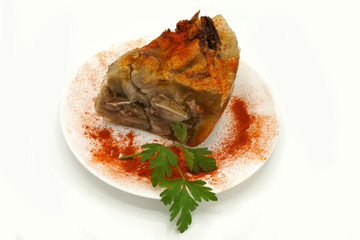 Traditional Romanian homemade pork trotter jelly dish called piftie. Jellied pork aspic made with...