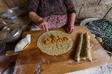 Turkish flat bread bazlama on white background