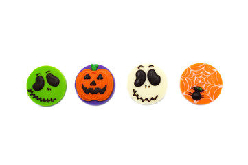 Cute Halloween gingerbread chocolate cookie treat isolated on white background. Homemade biscuit for holiday festival. Treats for party. Top view.