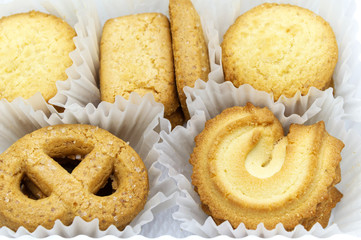 Variety Christmas Danish style butter cookies biscuit placed in the white ruffled paper baking...