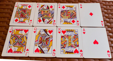 Playing cards with ace, king , queen and joker.