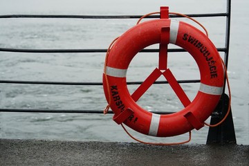 lifebuoy on the side of the karsibor ferry for people who are not residents of swinoujscie, no road connection to the mainland
