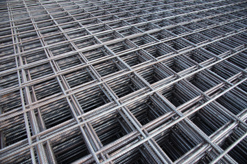 Steel bar iron wire in factory.Steel Rebars for reinforced concrete  construction site.Steel reinforcement bar for industrial building - obrazy, fototapety, plakaty