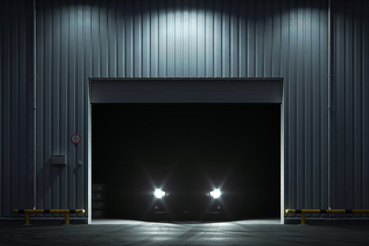Car with luminous headlights stands at night in garage. 3d render