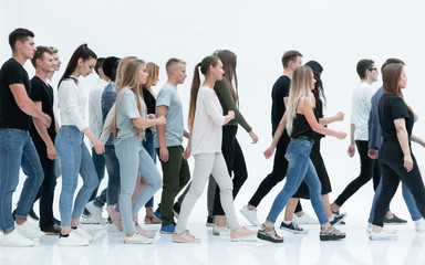 Fototapeta premium group of young people striding towards their goal.