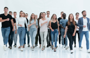 Fototapeta premium group of young people confidently striding towards their goal