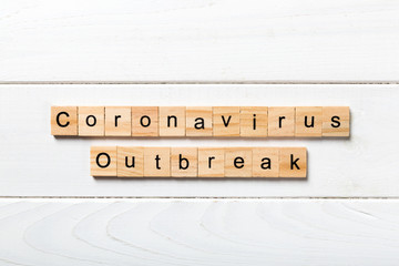 coronavirus outbreak word written on wood block text on wooden table for your desing, Wuhan Coronavirus, 2019-nCoV concept top view