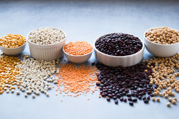set of various beans and peas in white close up. concept vegan protein