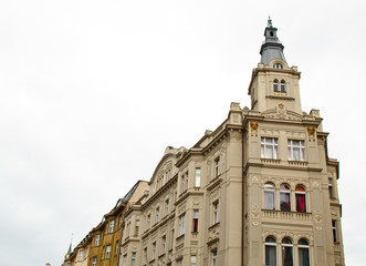 Fototapeta na wymiar Prague, Czech Republic. 10.05.2019: Close-up view of the facade with windows of old historical buildings in Prague. Retro, old-fashioned, vintage, last century.