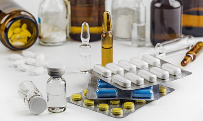 Medications for treatment. Tablets and capsules in blisters