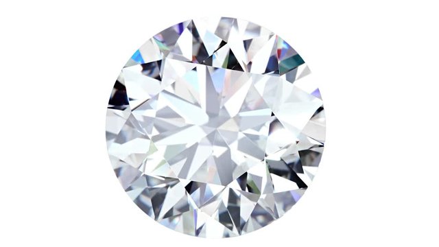 Natural big round diamond on a white background Unique extreme close up shooting. 