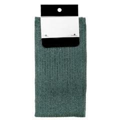 Green long washcloth for body and shower. Folded, new with a blank label for inscription isolated...