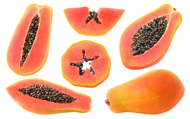 Isolated cut papaya. Collection of whole papaya fruits and pieces of various shapes isolated on...