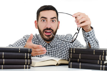 Beautiful stylish young male student having surprised expression, looking with big opened eyes and mouth in camera being happy to pass exam. Suddenness concept. Isolated on white background